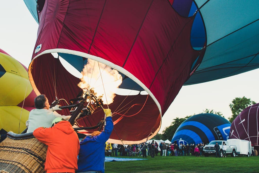 Three People Inside the Hot Air Balloon